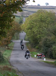 Bikes en- route with Alan Baileys Ariel parked up